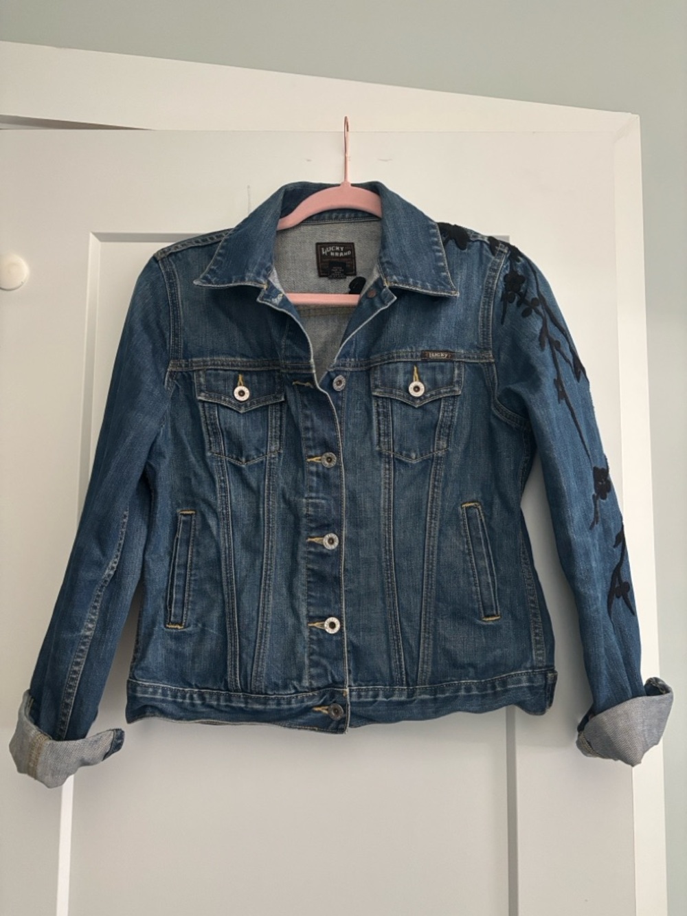 Lucky Brand Blue Denim Jacket with Black Floral Sleeve Embroidery